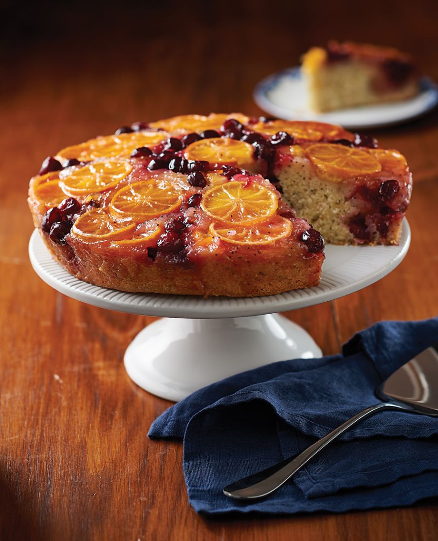 Clementines are buried with cranberries beneath the batter, and baked, only to come on out top as the darling of this moist, scrumptious upside-down cranberry-orange poppyseed cake.