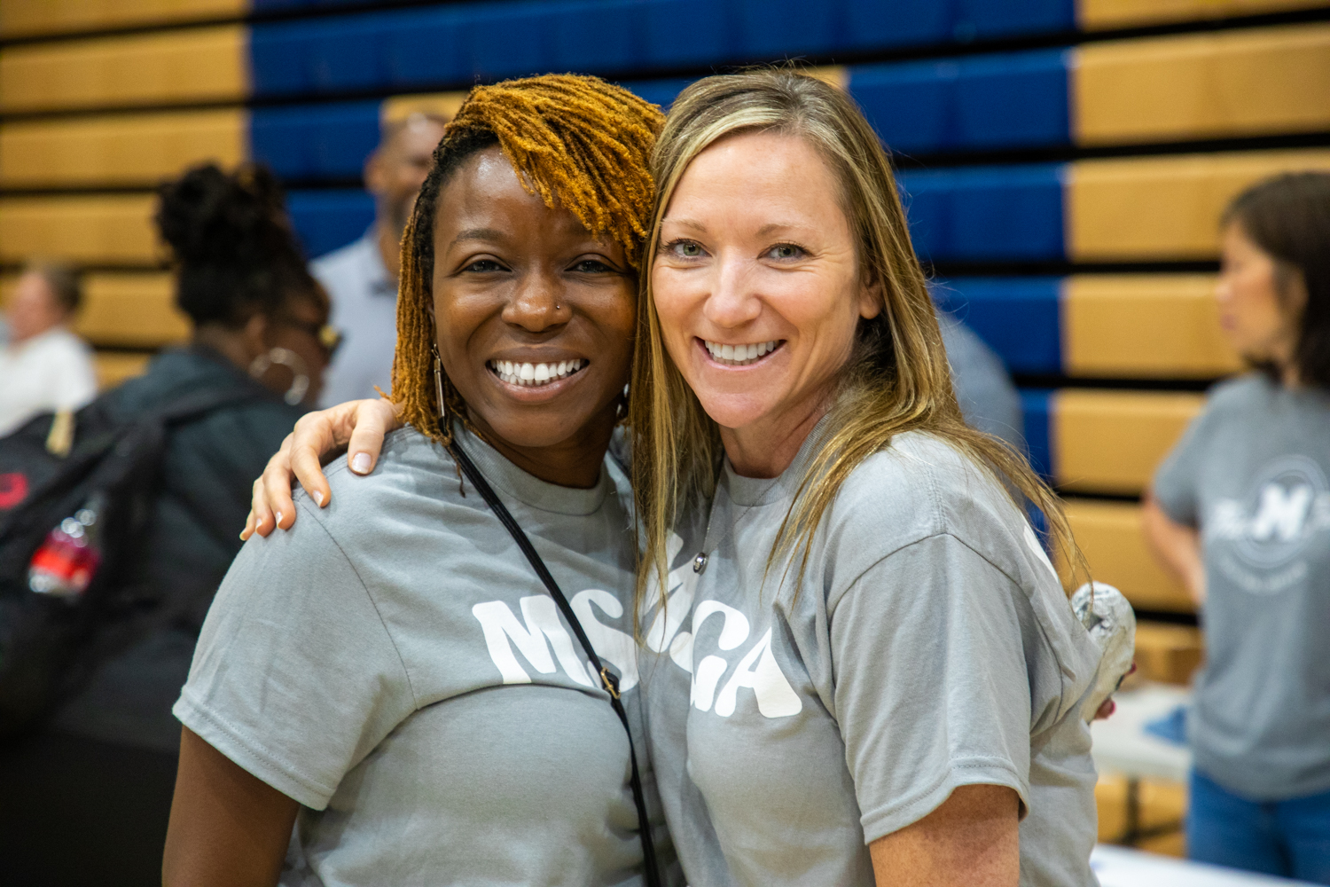 unknown persons standing outdoors