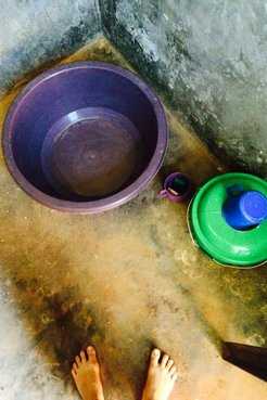 Bucket bath in Malawi