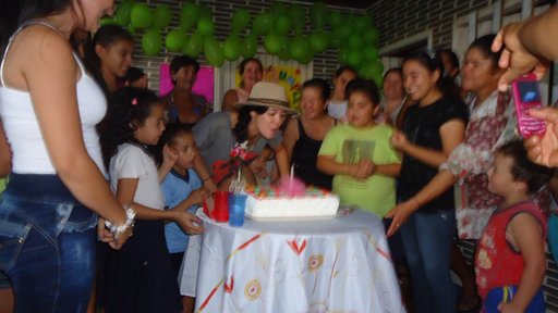 Kaitlyn Saruwatari blowing out the candles
