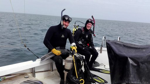 Peace Corps Response volunteer Christopher Giordano (right) with Dr. Yuri Hooker (left) before the first dive of their invest