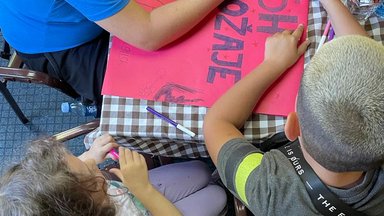 Community member helping at the pre-school
