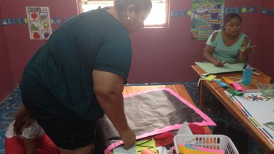 Lindsey's counterpart working at the pre-school