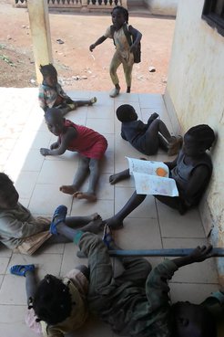 Students in Cameroon reading the books created by the students in California