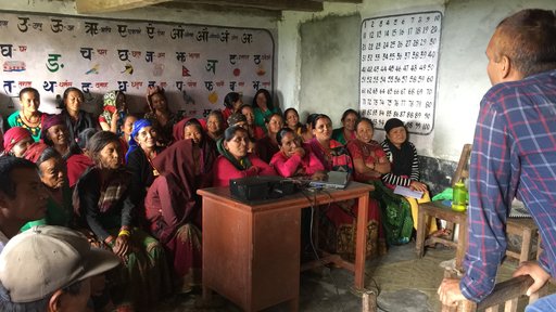Sushil Aryal of the Bayarghari Livestock Service Center talks to workshop participants about intensive goat management practi