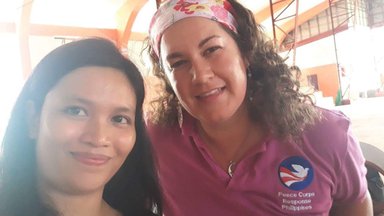 Two people smiling