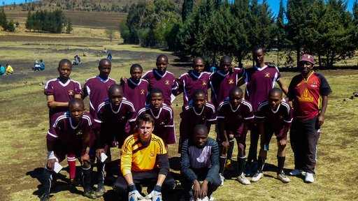 Travis as a Peace Corps Volunteer in Lesotho.