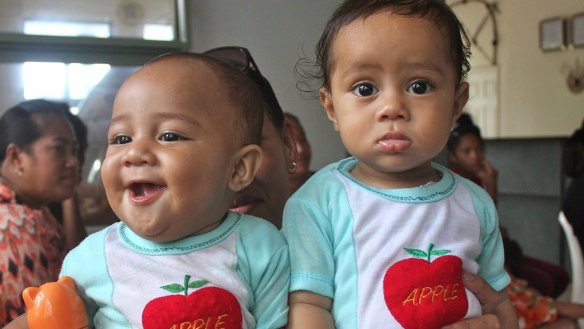These twins took turns sleeping throughout the judging.