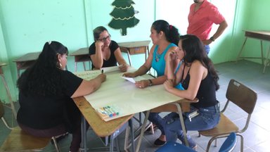 Community parents sharing ideas to encourage the positive development of their children