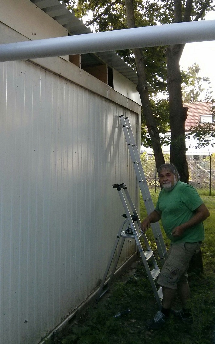 Rolf closing east part of roof of West container