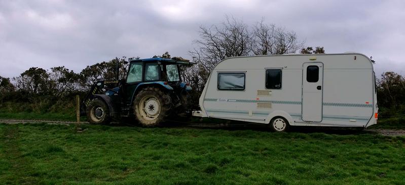 Stuck in mud, the caravan had to be tracted by a tractor the day after