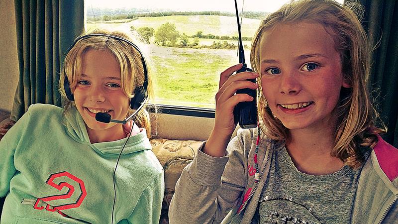 Clara and Lily sharing good moment in the caravan