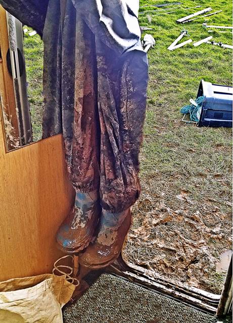 Trouser and boots hanged