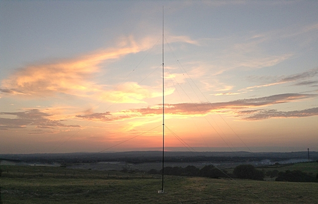 Beautifull sunset on the vertical 18m low band antenna