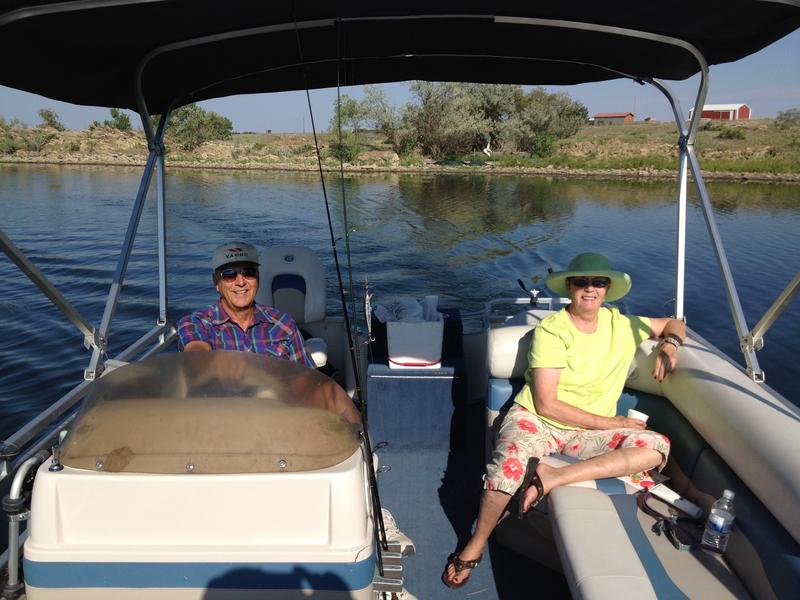 18 foot pontoon boat on Mc Caslin Lake