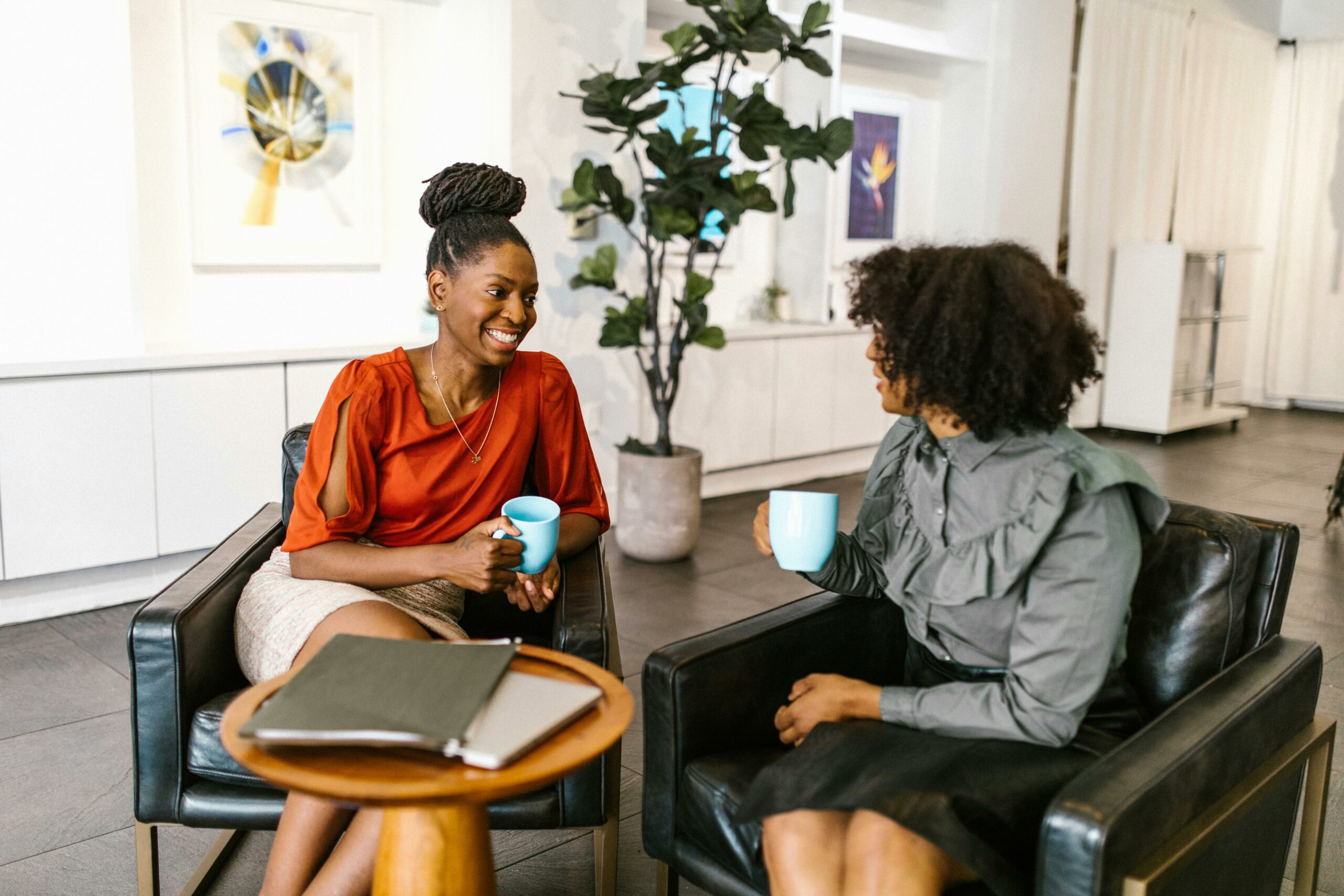 Two association members connecting over coffee, symbolizing community and retention through meaningful conversations.