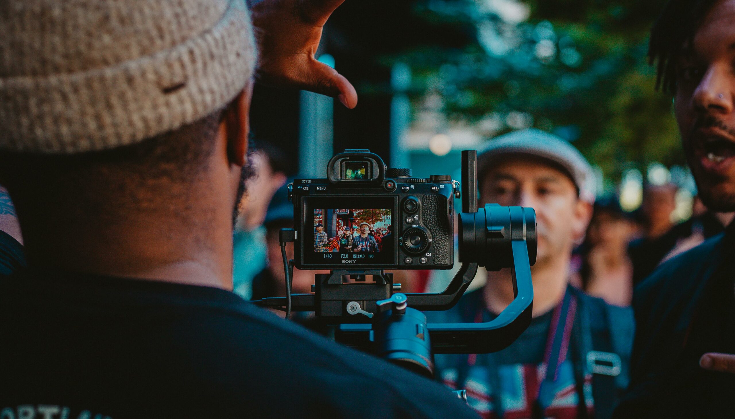 a man shooting a live video to create a branded event video content