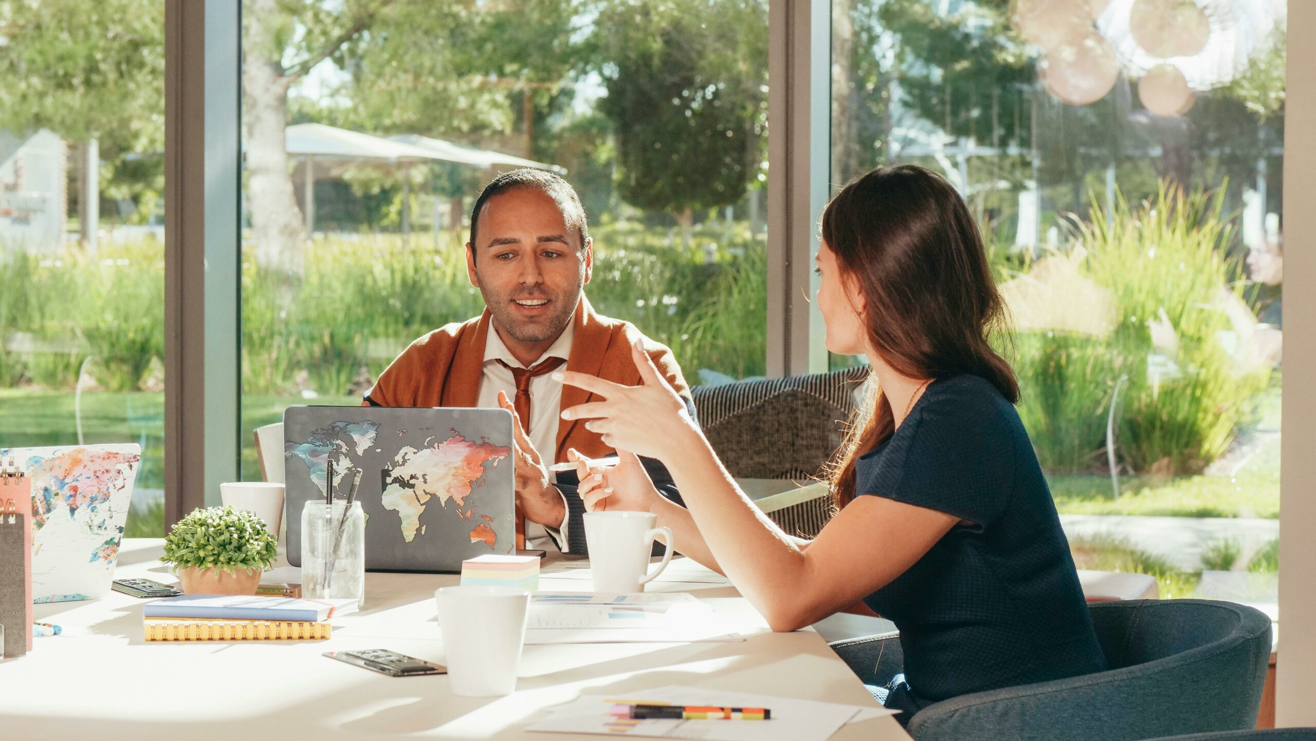 An association executive and affiliate partner are having a meeting to achieve scalable revenue stream for the association.