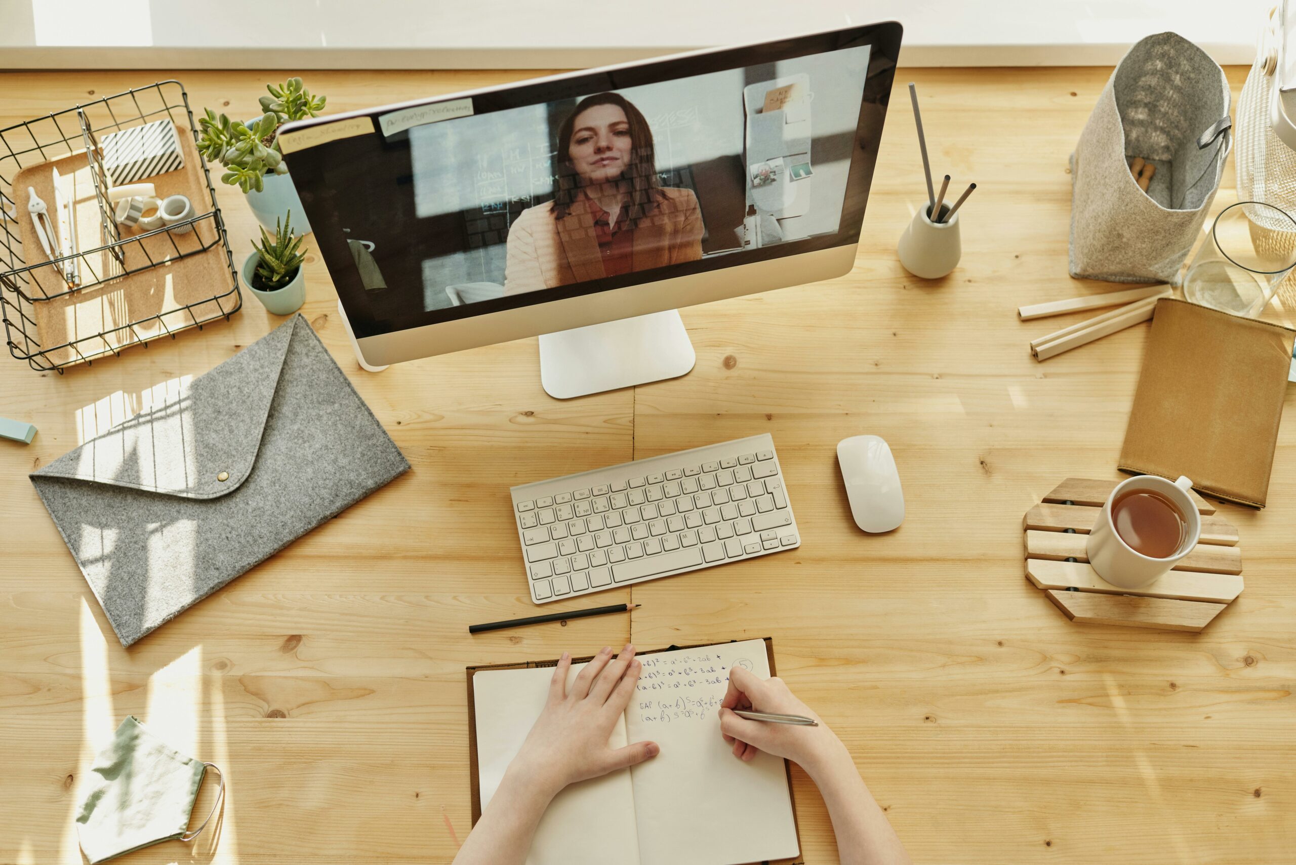 A woman is watching a microlearning video for professional development.