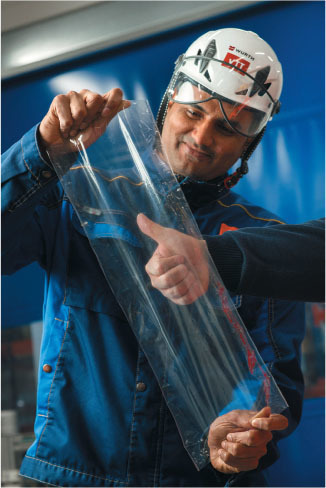 vtt researchers display clear film developed from cellulose