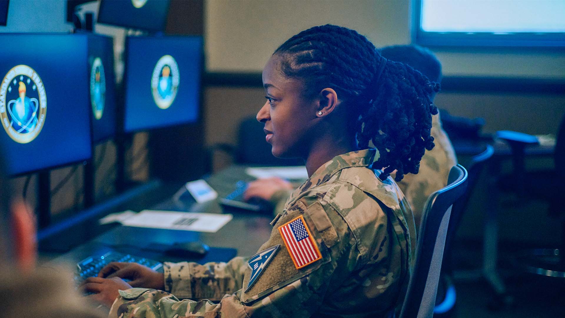 Syriah Harris working at her computer