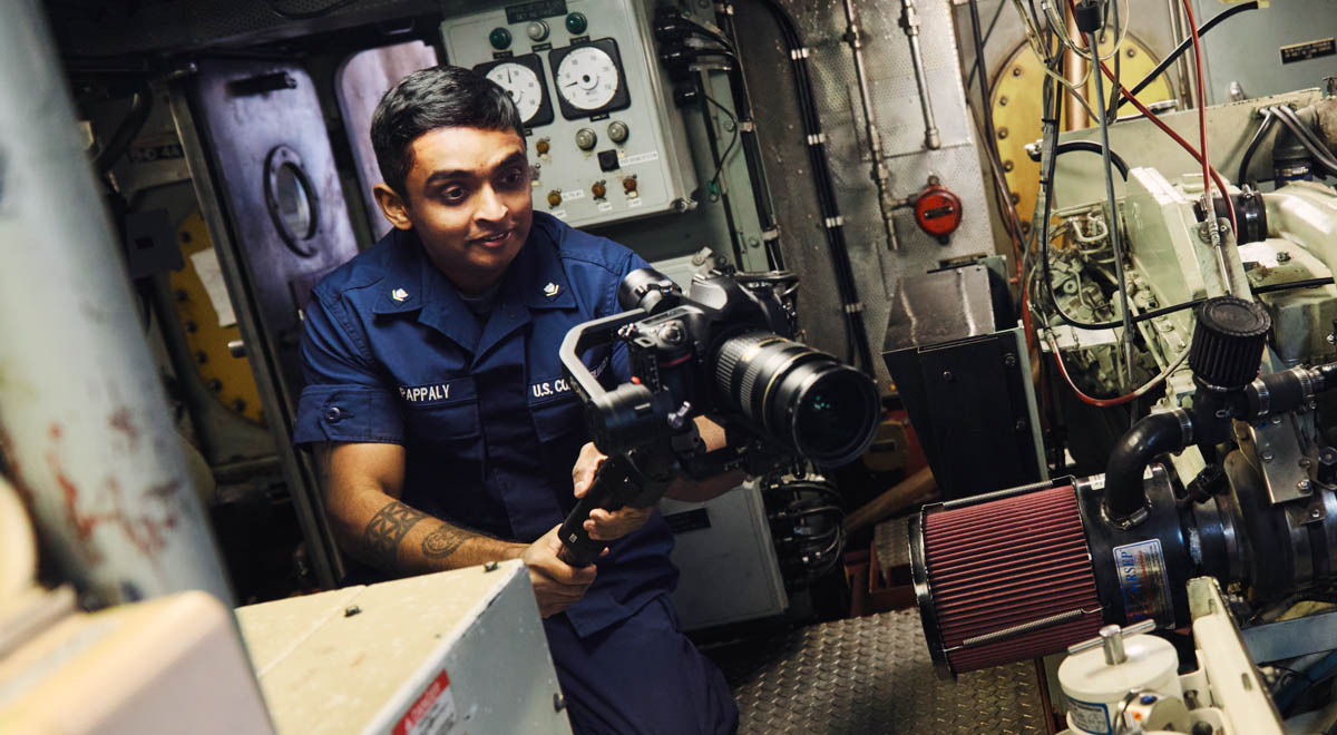 Anthony filming other service members