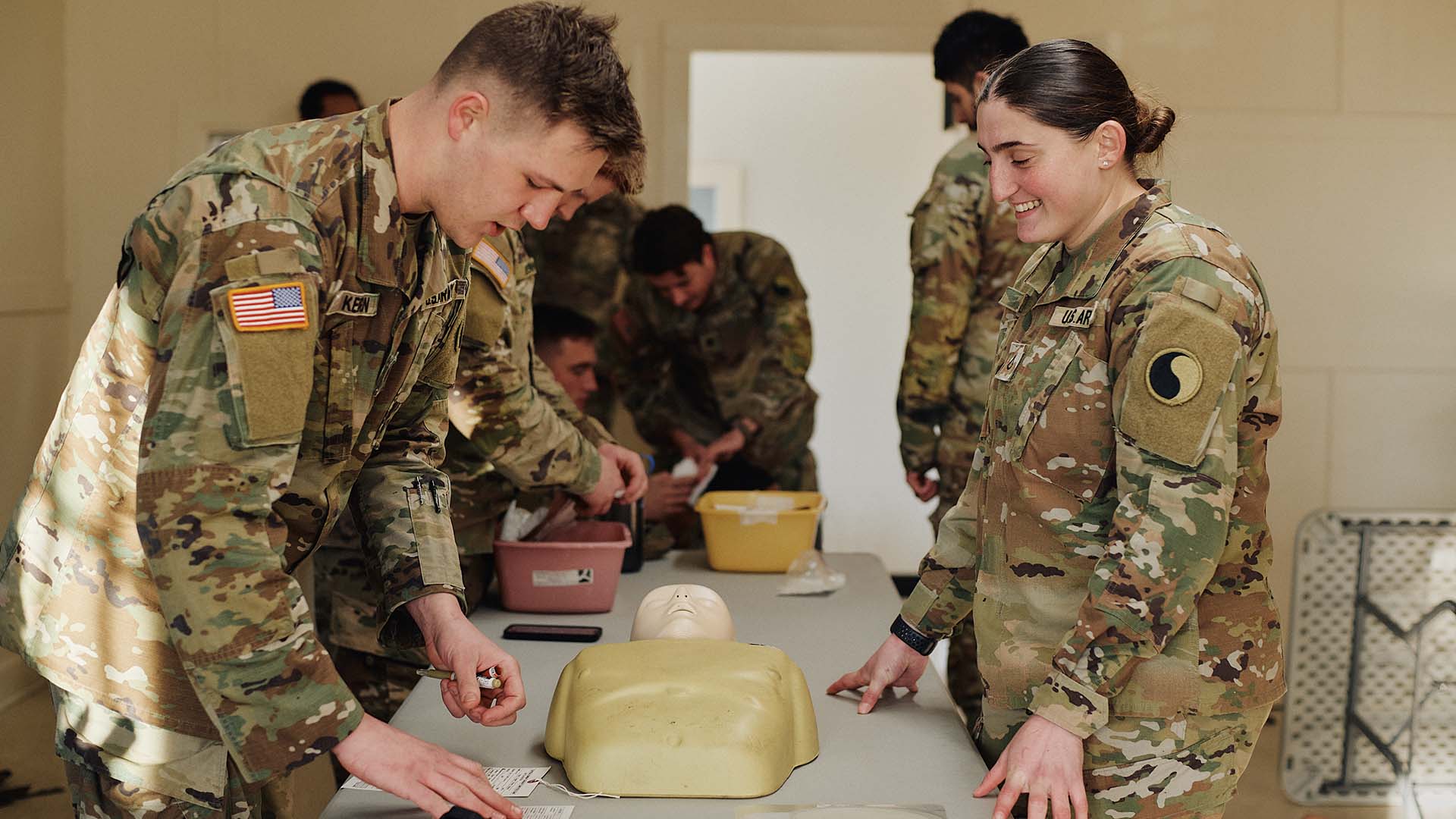 Noor Habr training other service members