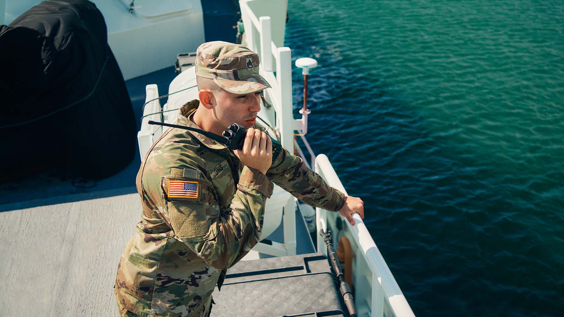Juan Canas, using a walkie to communicate
