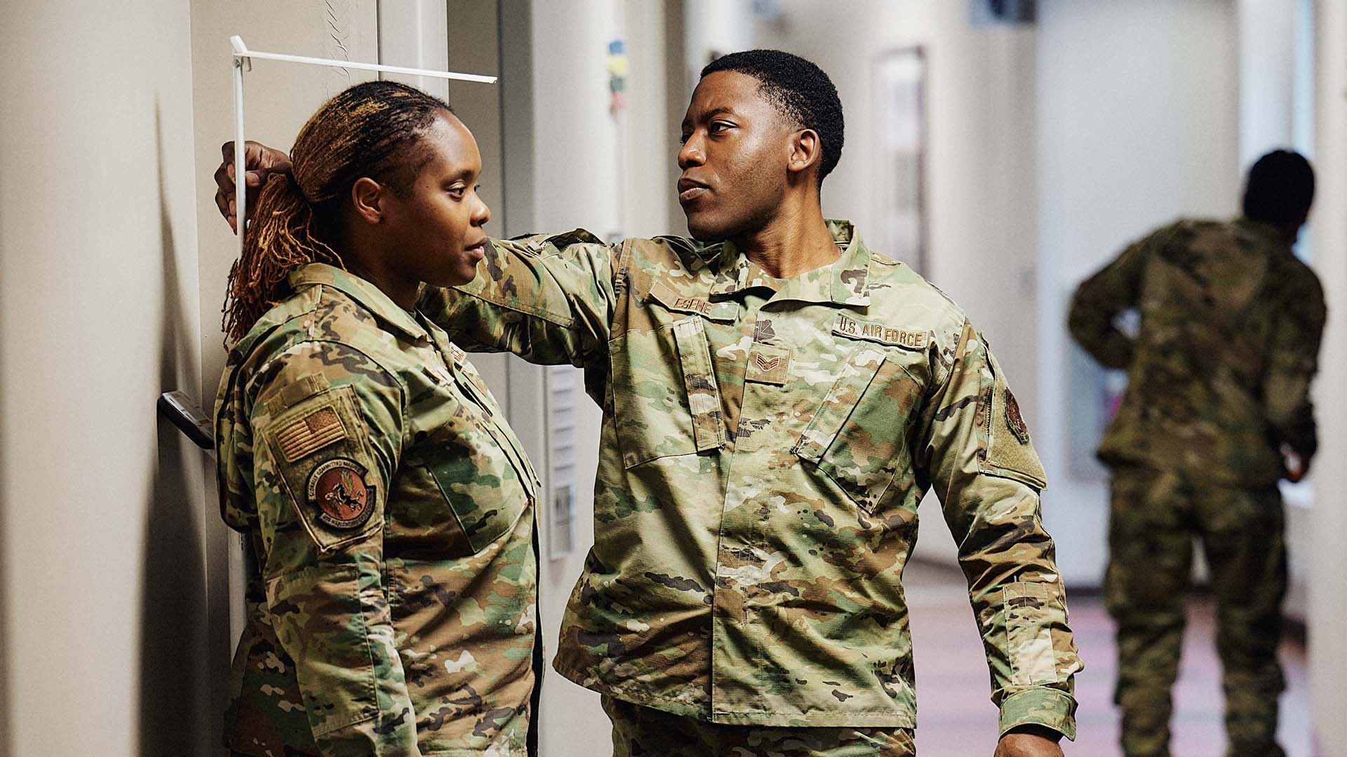 Isaac Esene checking the height of a patient