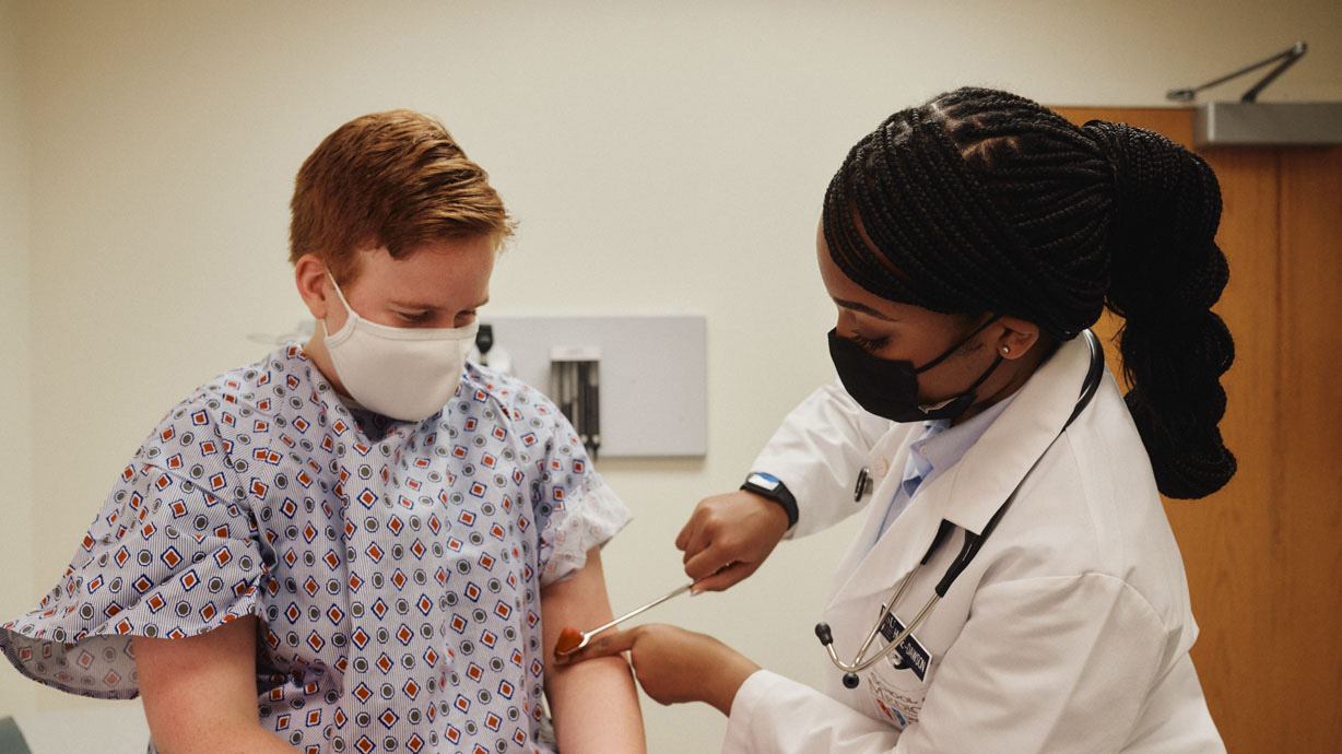 Physician administering an exam