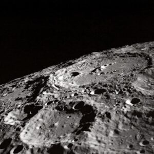 Black and white image of moon's pocked surface