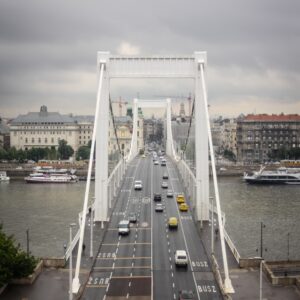 Image of bridge with car lanes, bus lanes, and walking or biking paths