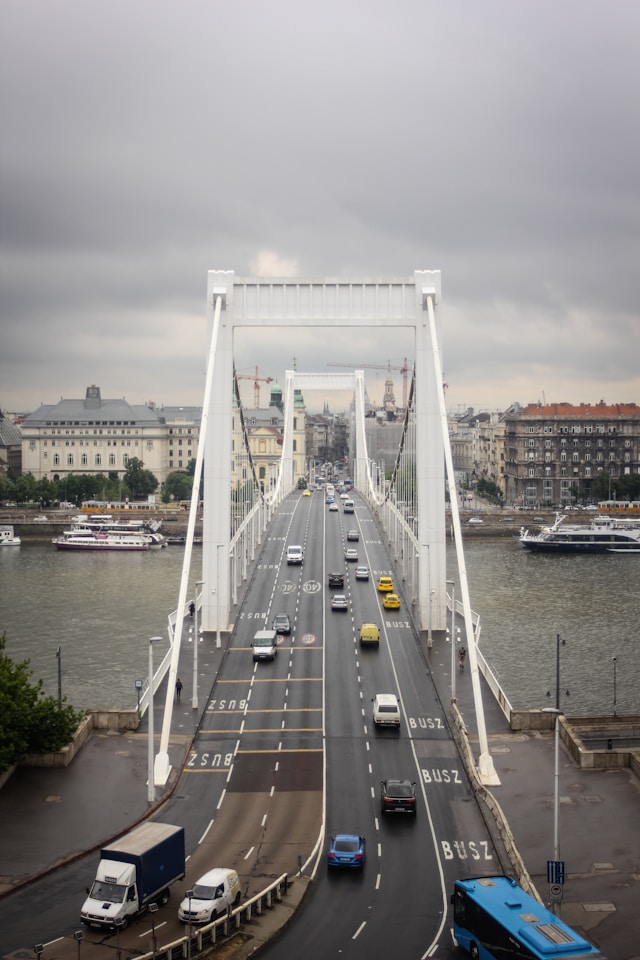 Image of bridge with car lanes, bus lanes, and walking or biking paths