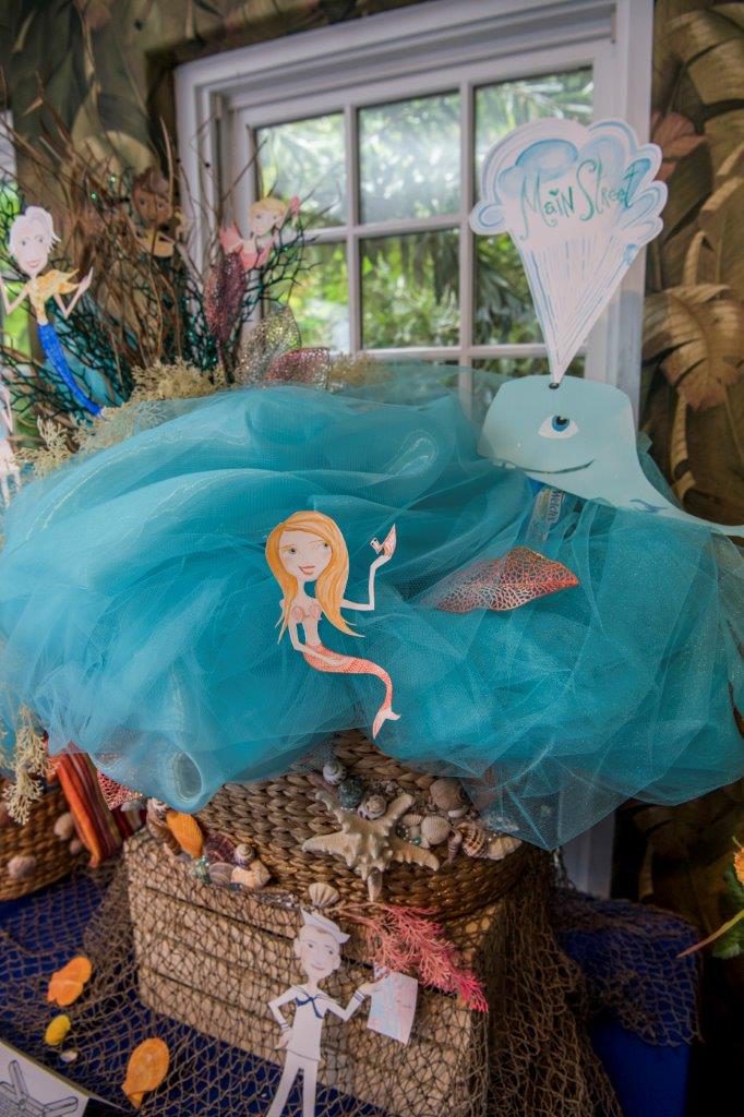 That is Michael Saunders as a mermaid ion the upper left.