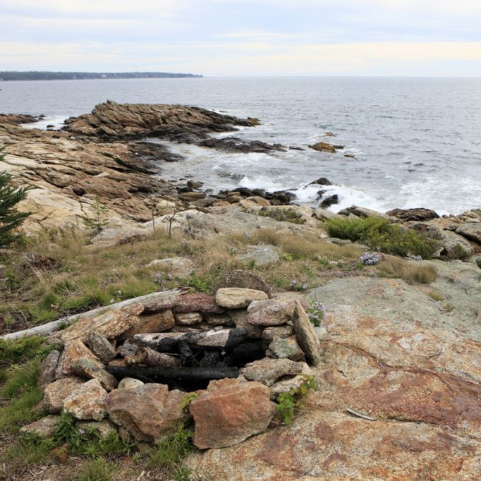Fire circle on shore looking south