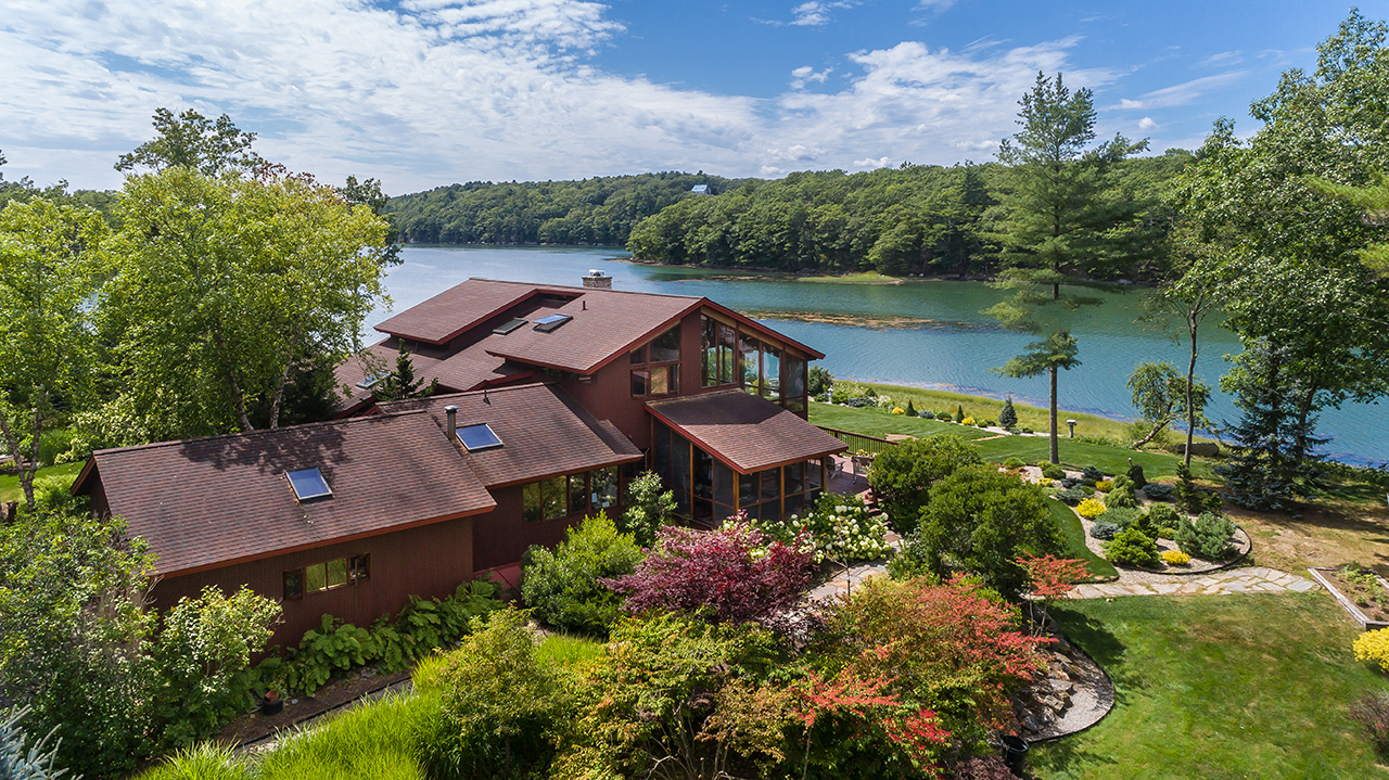 Custom deckhouse on the water Sunny Acres house