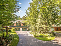 GORGEOUS contemporary Adirondack home in beautifully landscaped, certified wildlife habitat surroundings.