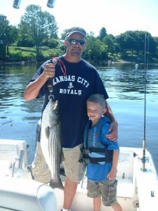NH Lakes Region fishermen and s significant Striped Bass
