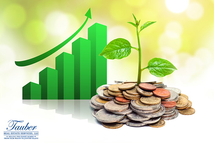 Green trees stacked on coins with rising chart resembles growing economy.