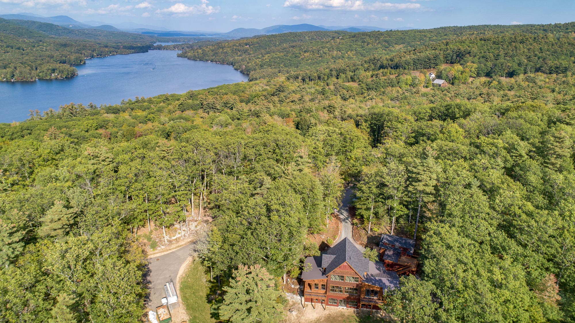 Squam Lake is at your footsteps with the purchase of this new construction home.
