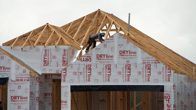 House under construction with home wrap