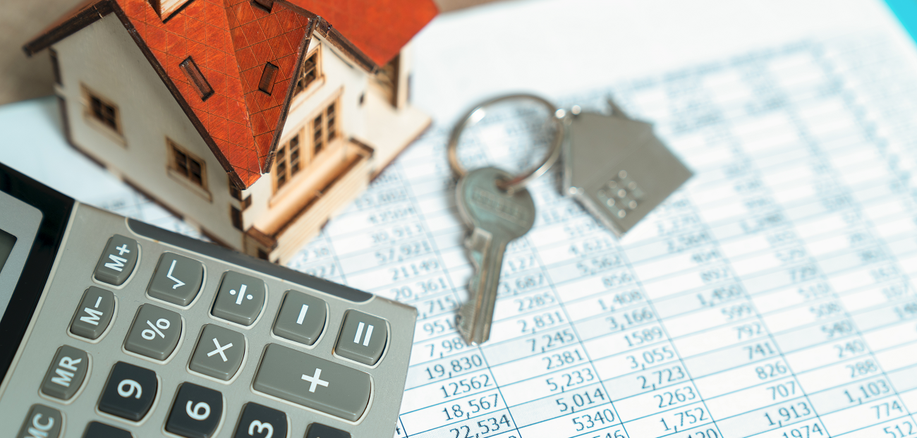 calculator, home and keys mortgage rates