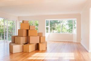stacked boxes in empty room