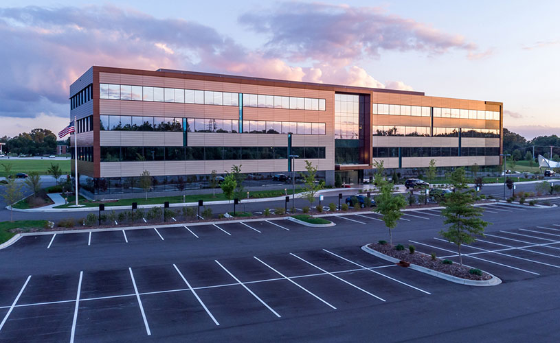 Evening Shot Of Office Building Exterior