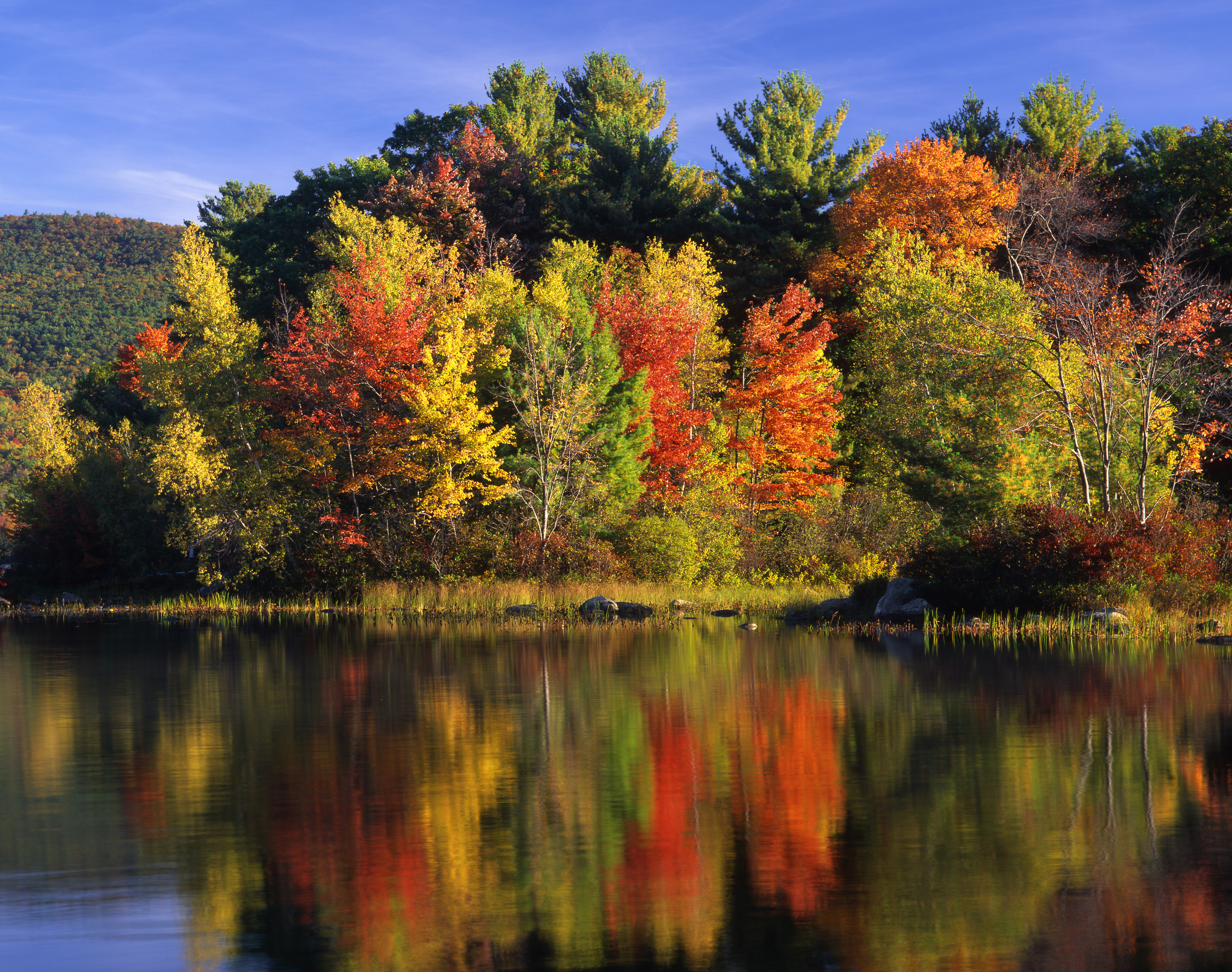 A ground-level view of Lake Kanasatka during the fall, located in Moultonborough, NH