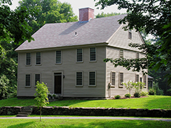 A single-family home surrounded by trees in Eastman, NH