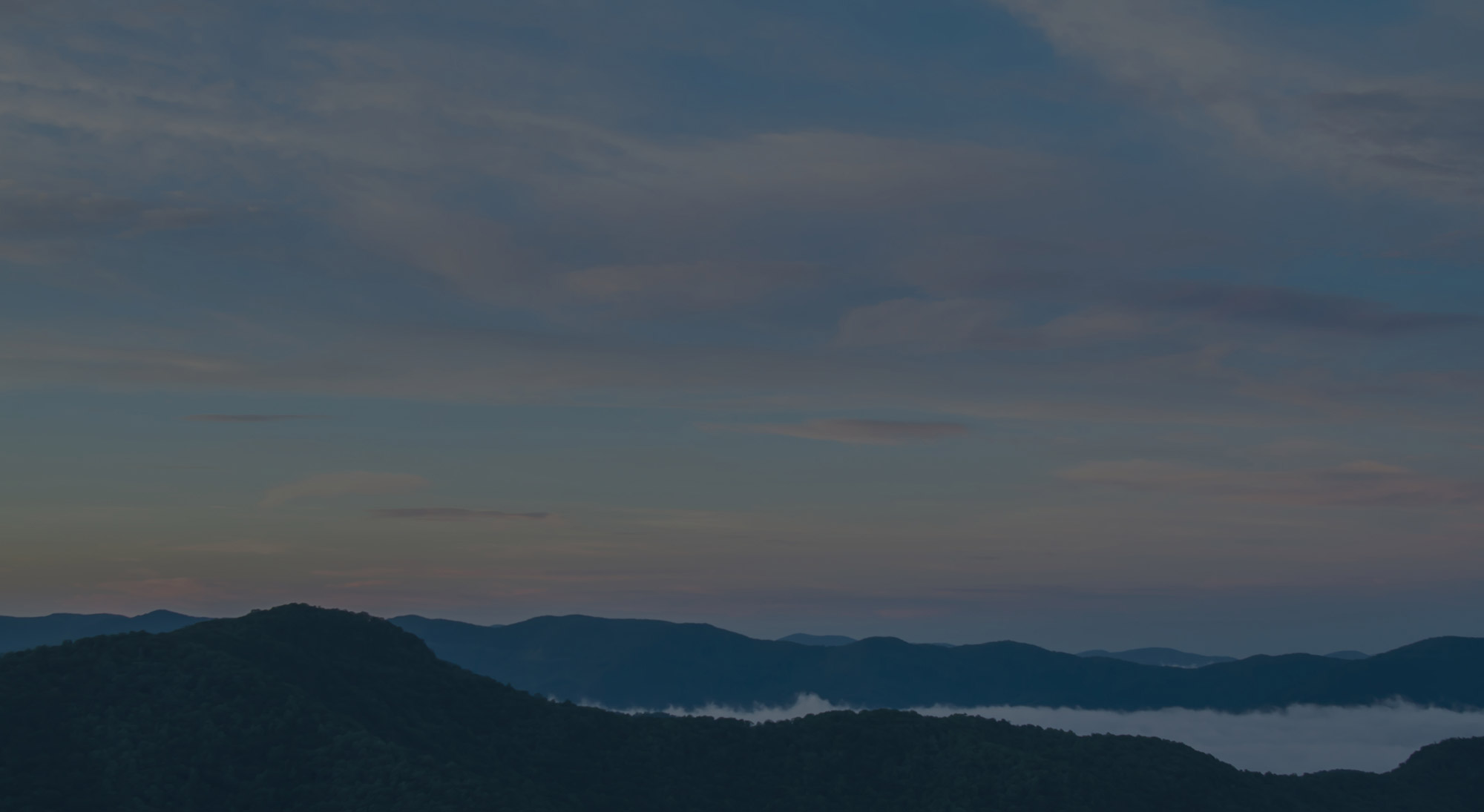 foggy peaks of the blue ridge mountains