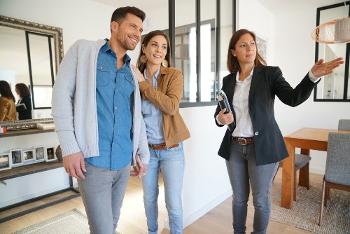 Real Estate Agent Working with Clients
