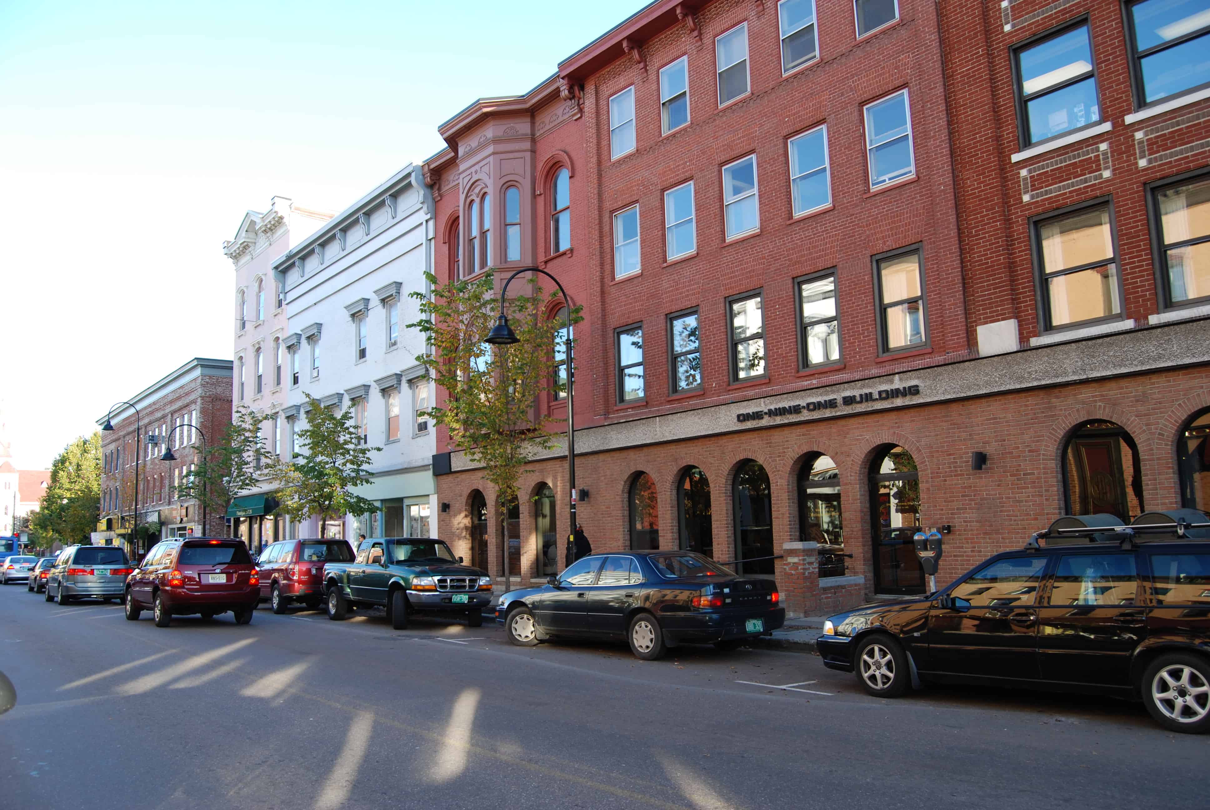 A photo of parked cars in downtown Burlington Vermont