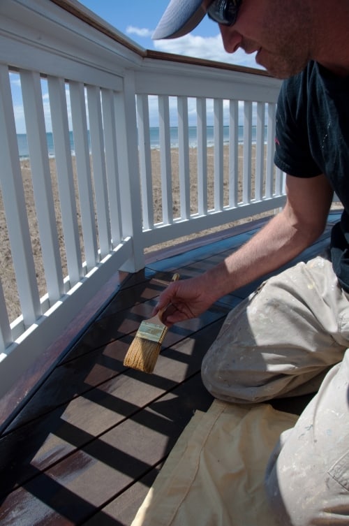 Doing Maintenance on Oceanside Deck